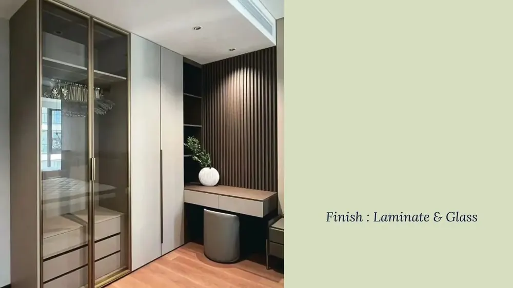 Wardrobe interior with PU and glass finish showing zoned storage sections